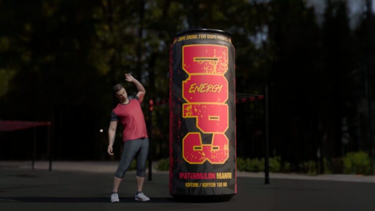 3D-mallinnettu DOP3-energiajuomatölkki suurennettuna ilmatäytteiseksi versiona urheilupuistossa, tölkin vieressä venyttelevä hahmo.